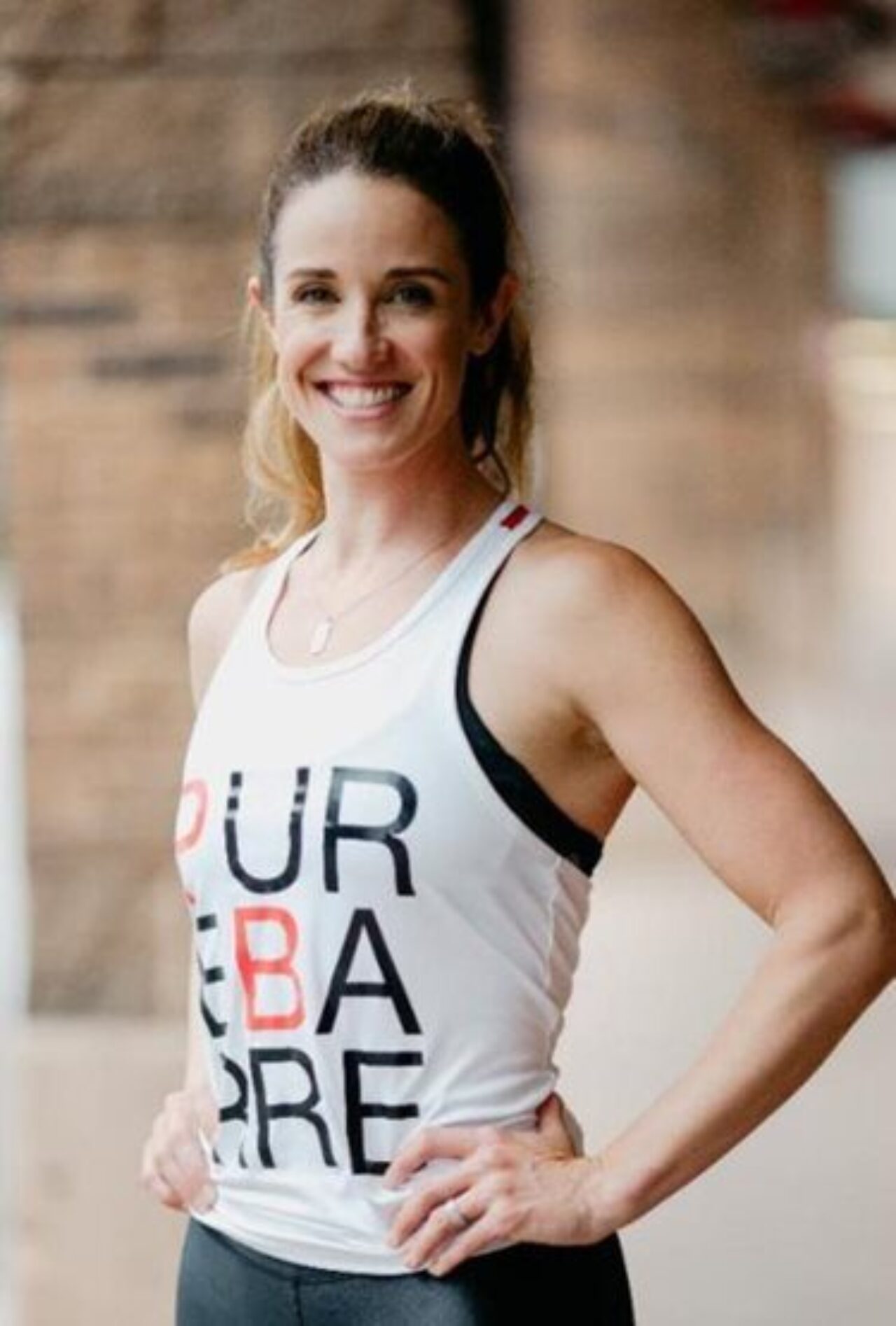 Lindsey Teets in her Pure Barre tank top at our Cherry Creek, CO hotel
