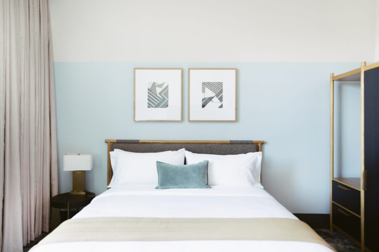 Denver hotel room decorated in light blue and white