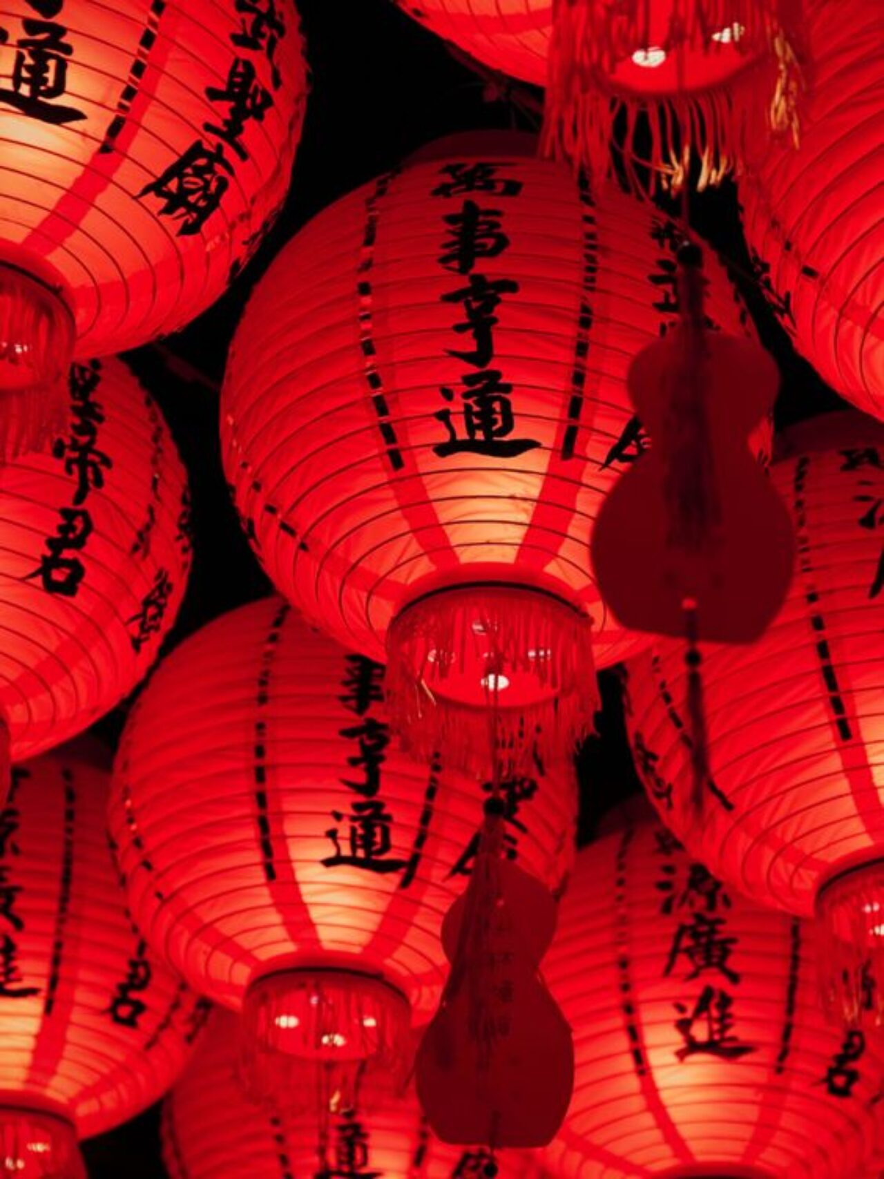 Red paper lanterns with Chinese writing at our boutique hotel in Denver