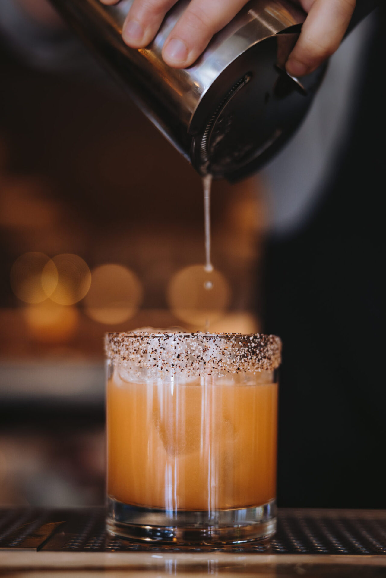 Cocktail being poured